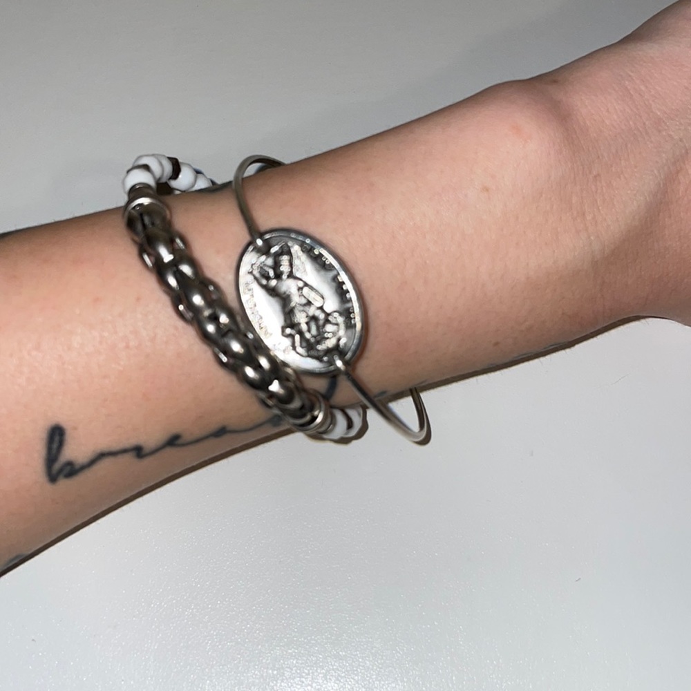 Aled and Ani St Christopher bracelet and white and silver bracelet
